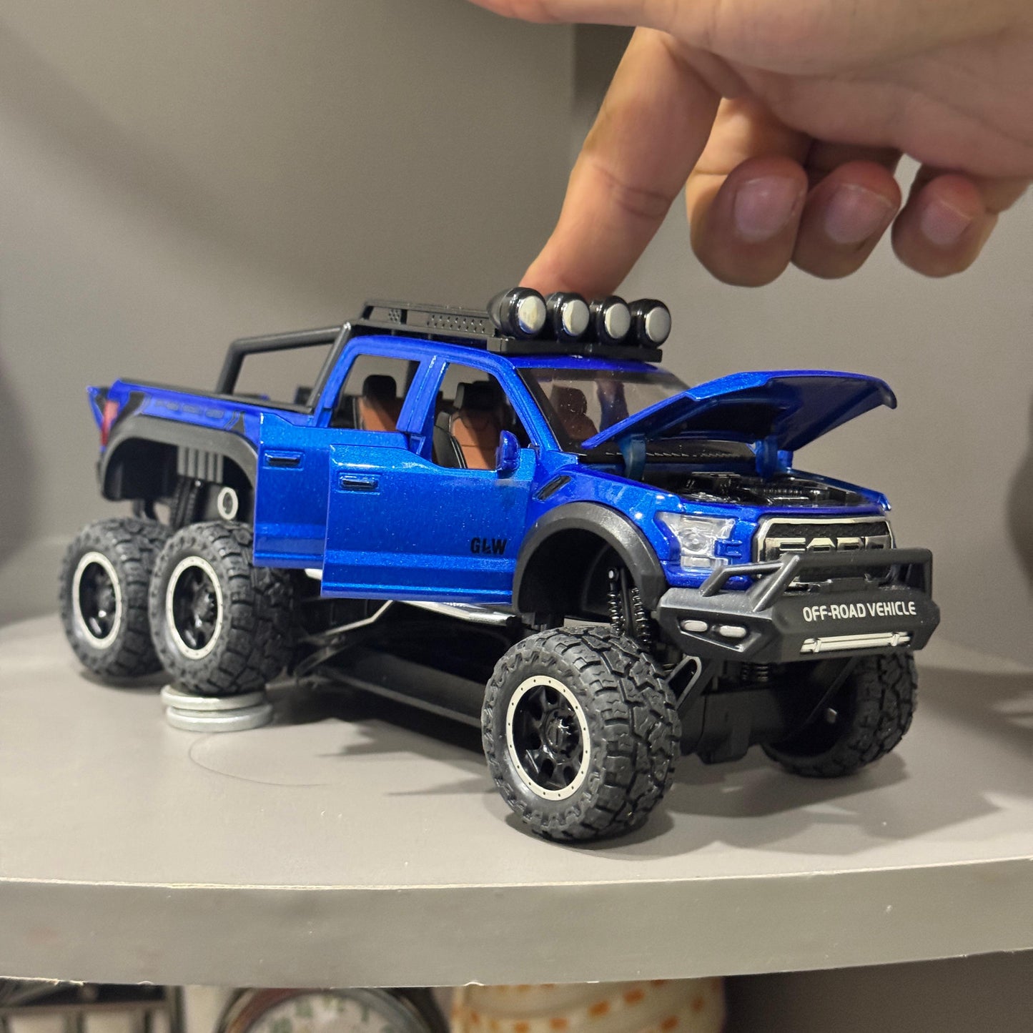 1:24 Ford Raptor F150 6x6 Diecast Model Truck | Modified Off - Road Alloy SUV | Pull Back Action | Metal Toy for Kids & Collectors - Mahal Al Madinahdiecast carMahal Al MadinahMahal Al MadinahBLUE1:24 Ford Raptor F150 6x6 Diecast Model Truck | Modified Off - Road Alloy SUV | Pull Back Action | Metal Toy for Kids & Collectors1:24 Ford Raptor F150 6x6 Diecast Model Truck | Modified Off - Road Alloy SUV | Pull Back Action | Metal Toy for Kids & Collectors