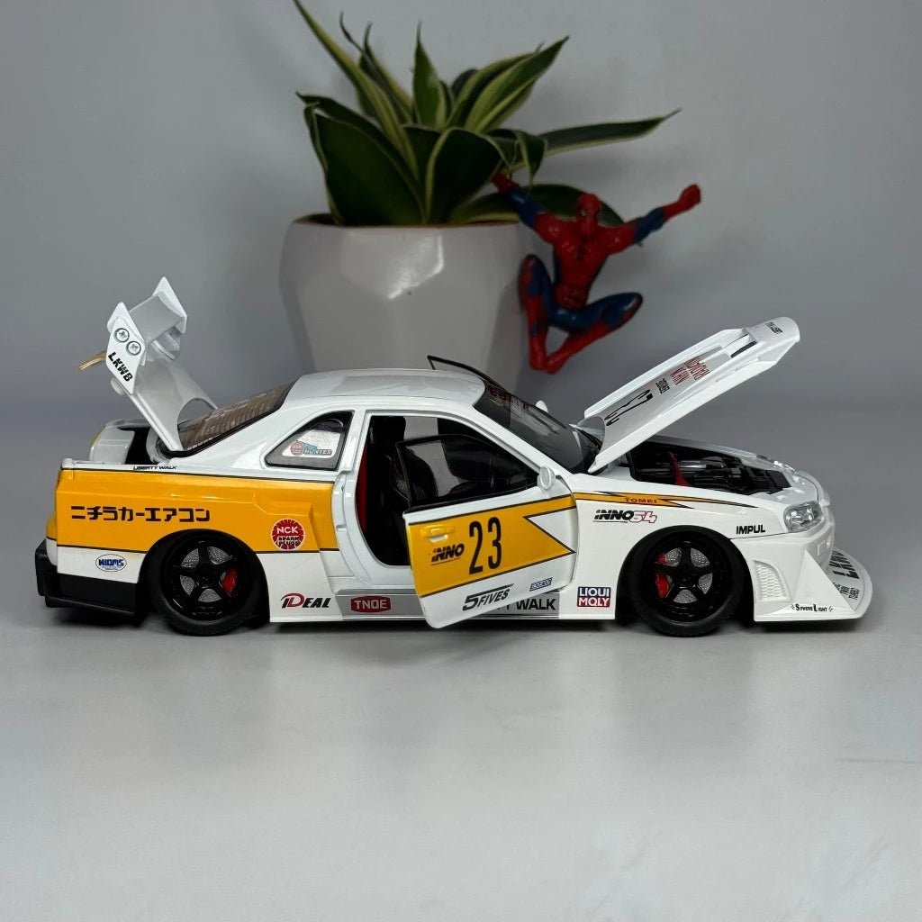 1:24 Nissan Skyline GTR R34 Ares Wide Body Diecast Model | Alloy Sports Car with Sound & Light - Mahal Al MadinahMahal Al MadinahMahal Al MadinahN1:24 Nissan Skyline GTR R34 Ares Wide Body Diecast Model | Alloy Sports Car with Sound & Light Mahal Al Madinah1:24 Nissan Skyline GTR R34 Ares Wide Body Diecast Model | Alloy Sports Car with Sound & Light