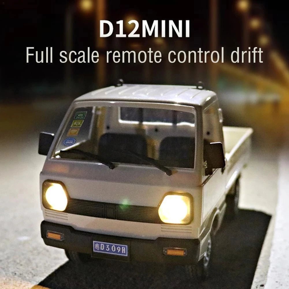 Electric RC Suzuki Ravi Van D12 – 1:16 Scale Remote Control Truck | 4 Channel Climbing Car | Educational Toy for Boys | Rechargeable Gift for Kids - Mahal Al Madinahdiecast carMahal Al MadinahMahal Al MadinahElectric RC Suzuki Ravi Van D12 – 1:16 Scale Remote Control Truck | 4 Channel Climbing Car | Educational Toy for Boys | Rechargeable Gift for KidsElectric RC Suzuki Ravi Van D12 – 1:16 Scale Remote Control Truck | 4 Channel Climbing Car | Educational Toy for Boys | Rechargeable Gift for Kids