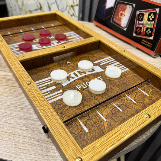 Wooden Pucket Board Game for Kids & Adults | 2 Player Fast Sling Puck Game | 18x10 Inch Family Fun Game | Tabletop Action Game for Parties & Home - Mahal Al MadinahGAMESMahal Al MadinahMahal Al MadinahWooden Pucket Board Game for Kids & Adults | 2 Player Fast Sling Puck Game | 18x10 Inch Family Fun Game | Tabletop Action Game for Parties & HomeWooden Pucket Board Game for Kids & Adults | 2 Player Fast Sling Puck Game | 18x10 Inch Family Fun Game | Tabletop Action Game for Parties & Home